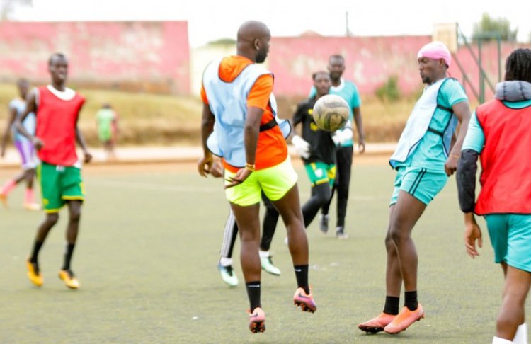 Addy Kenzo plays football at Nyamirambo stadium